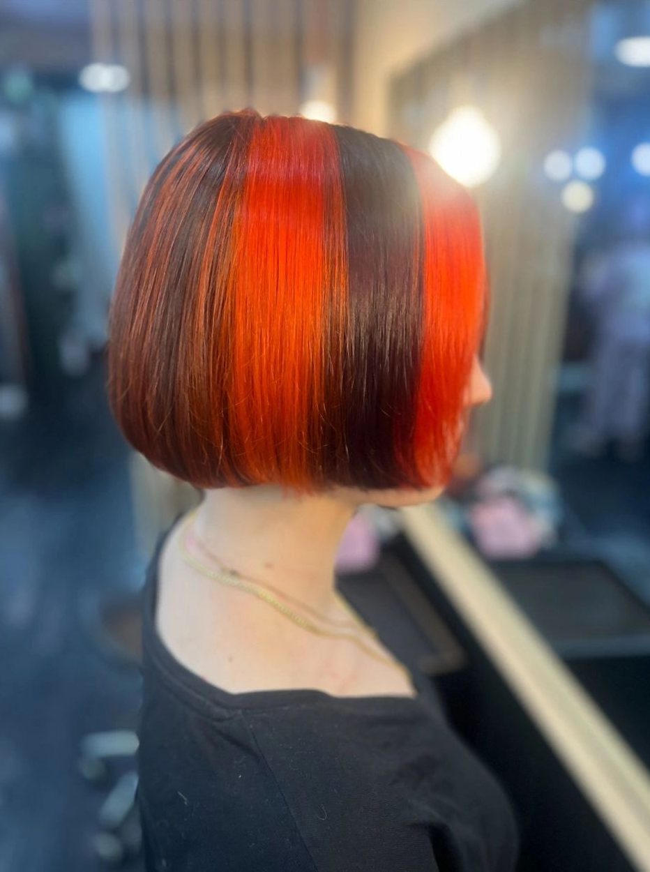 Sharp bob with bold red and black blocks of colour