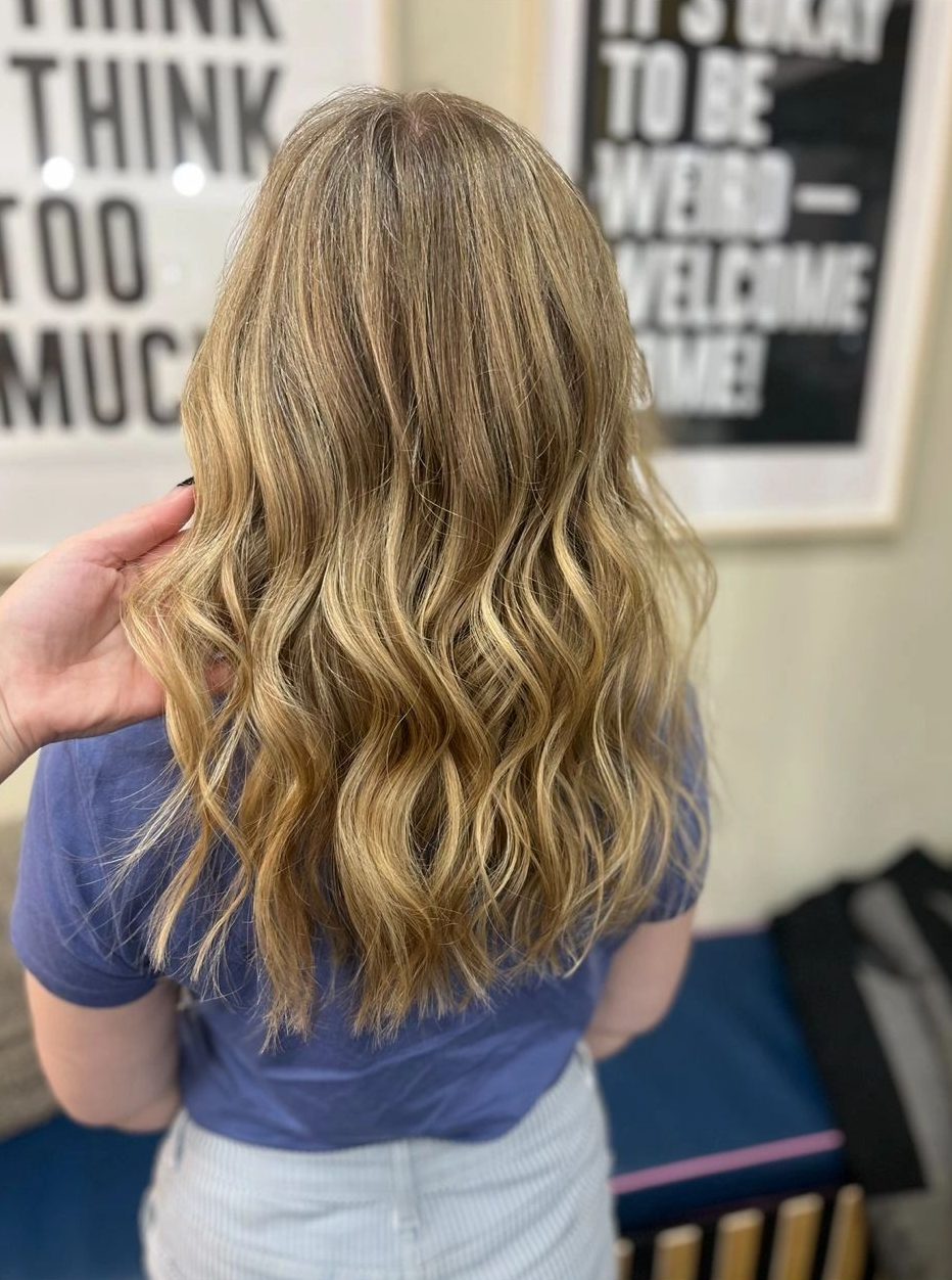 Long blonde waves, cut and finished