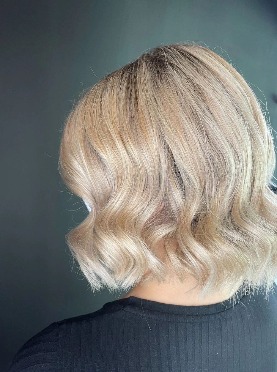Creamy platinum blonde bob with soft waves